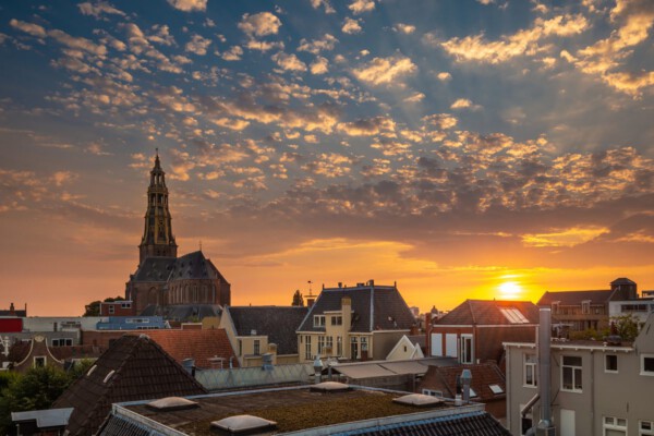 Stadswandeling Groningen: workshop zonsondergang fotografie Melvin Jonker- foto van Arjan Battjes